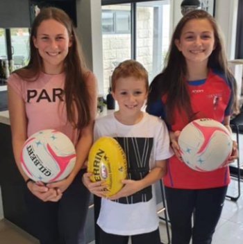 Footballs and netballs keeping juniors busy